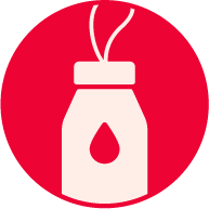 Female in light pink is looking into distance.