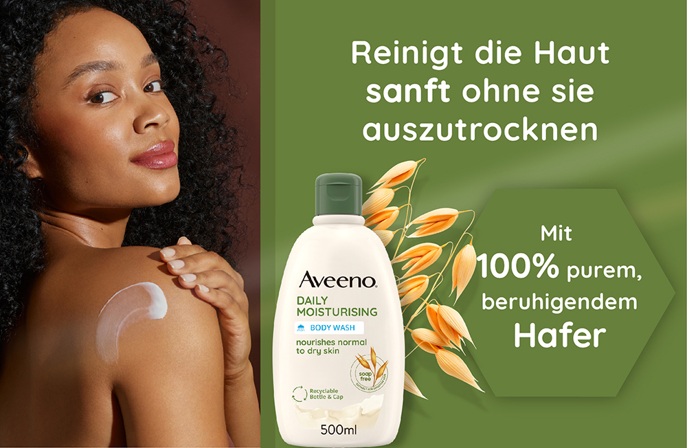 Frau reibt sich mit Produkt ein. Text: Reinigt die Haut sanft ohne sie auszutrocknen. Mit 100% purem, beruhigendem Hafer.