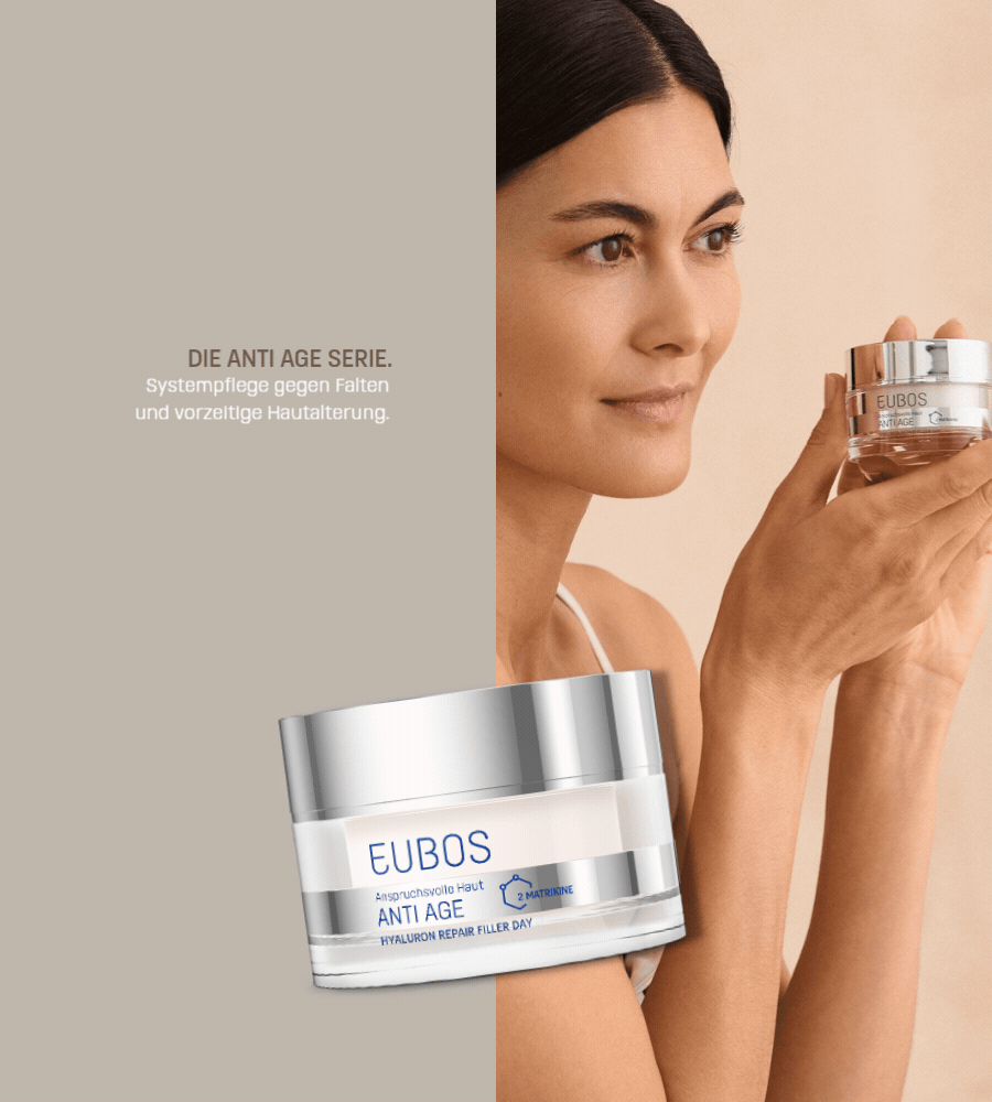 Frau mit Creme. Text: Hyaluron Repair Filler Day: Faltenmindernde Tagespflege. Hautstruktur.