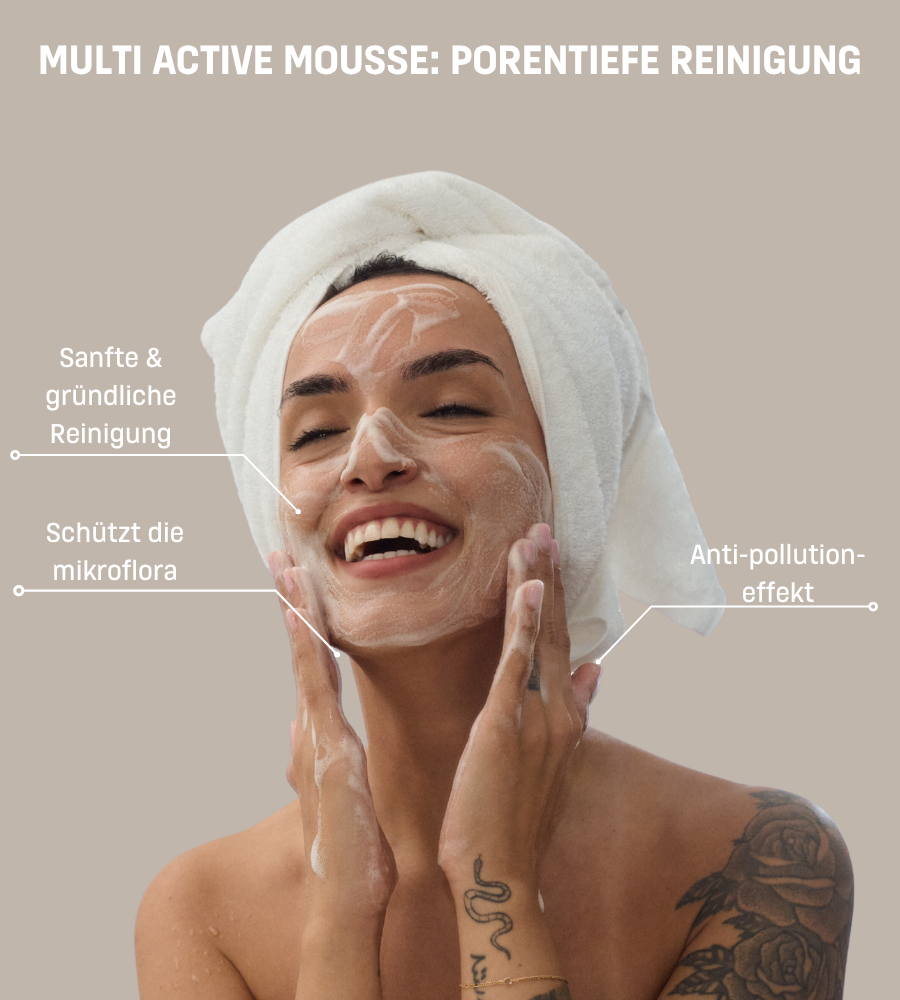 Frau wäscht Gesicht mit EUBOS Anti Age Mousse. Text: Porentiefe Reinigung, Anti-Pollution-Effekt.