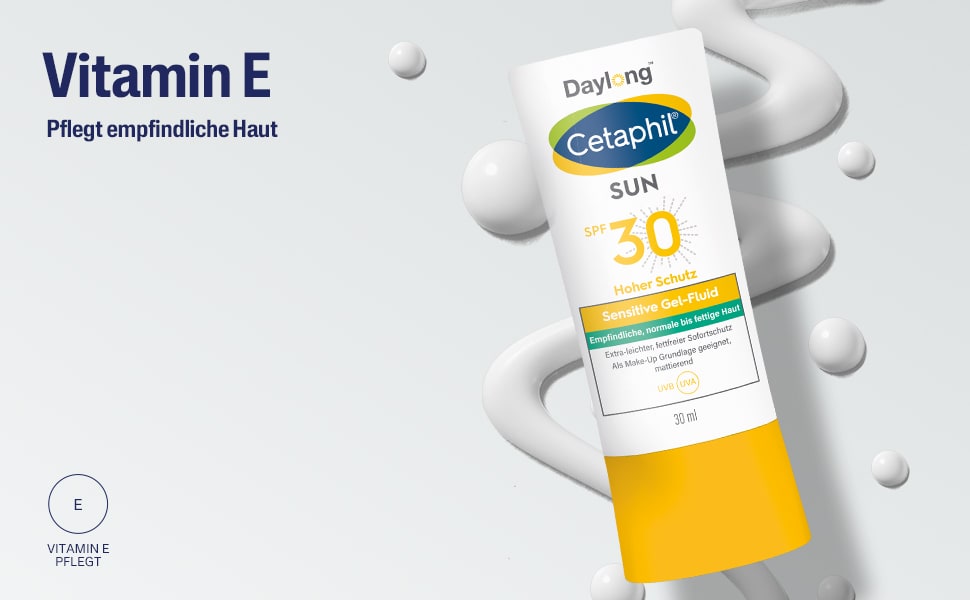 Produkt und Tropfen. Text: Vitamin E. Pflegt empfindliche Haut.