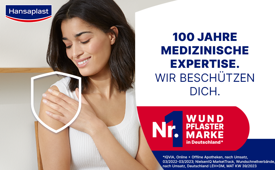 Schild mit Text: Schützt vor 99% der Bakterien. Text: Hansaplast Bacteria Shield Pflaster schützen vor Schmutz und 99% der Bakterien.