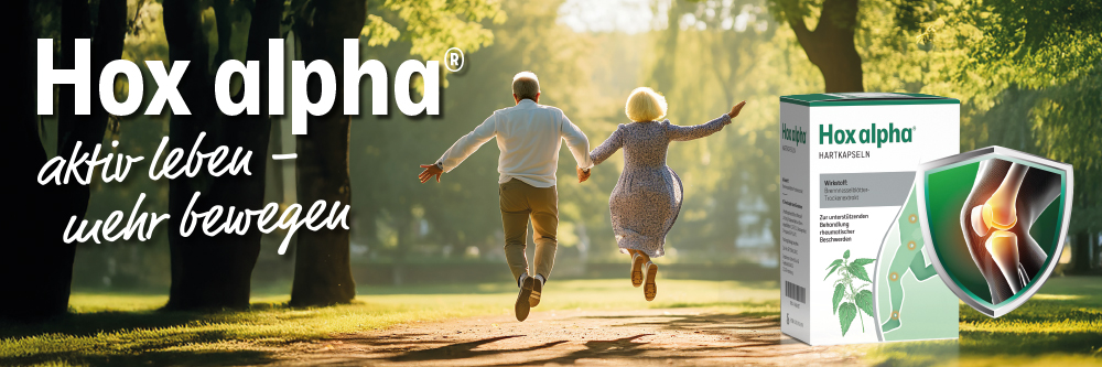 Älteres Paar läuft im Park. Hox alpha® Packung. Text: aktiv leben - mehr bewegen.