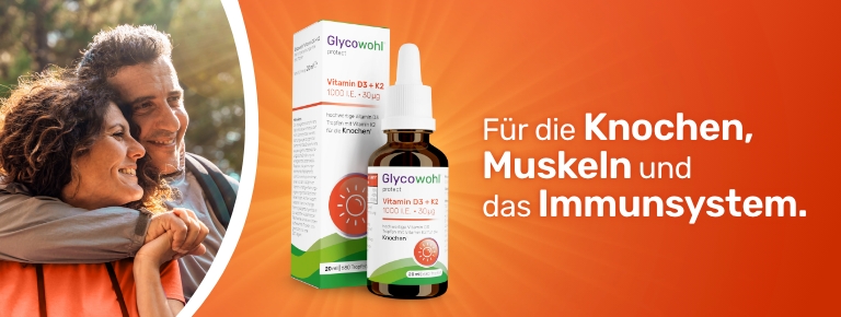 Paar im Freien mit Produkt und Verpackung. Text: Für die Knochen, Muskeln und das Immunsystem.