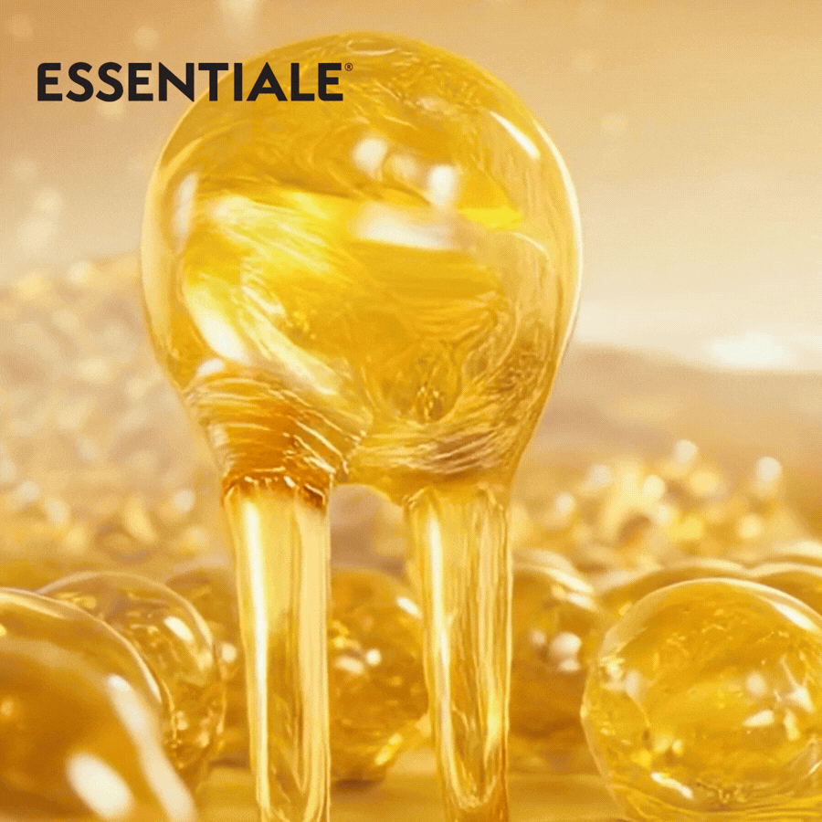 Essentielle Phospholipide als Tropfen, umgeben von weiteren Kapseln. Text: Ständig müde? Es könnte deine Leber sein.