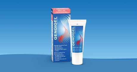 Gengigel® Gel-Tube und Schachtel. Blaue Tube mit roter Grafik. Schachtel mit Text: Gengigel, Oral Gel.