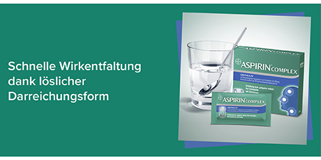Aspirin Complex Packung, Glas mit Flüssigkeit, Orangen. Text: Schnelle Wirkentfaltung dank löslicher Darreichungsform.